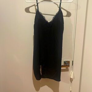 Our from under black slip top